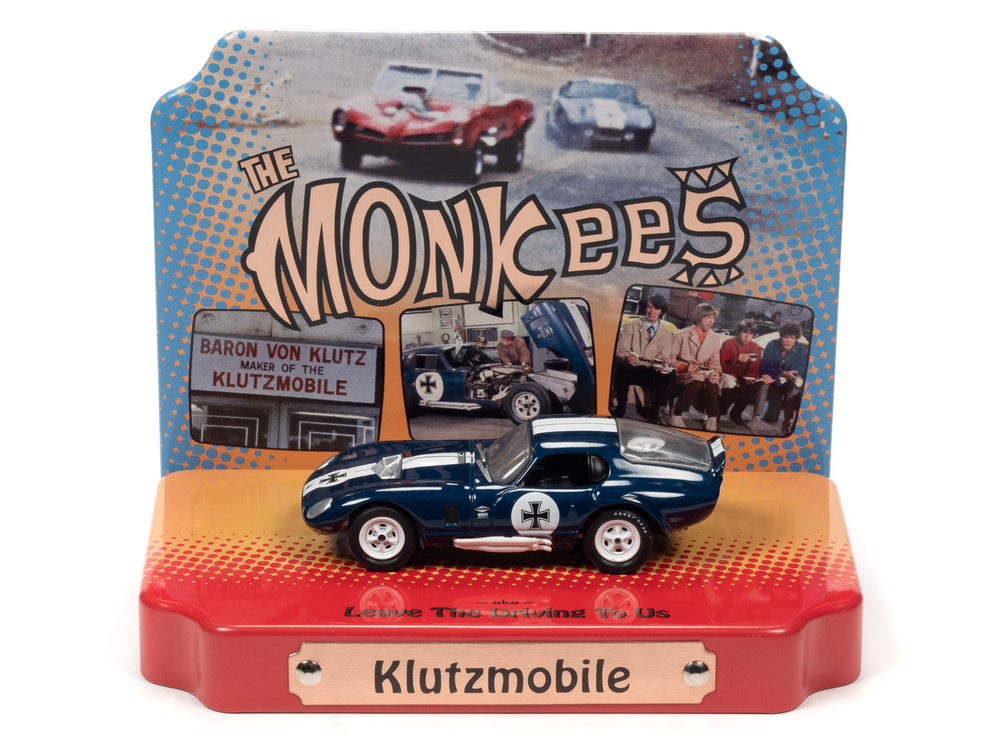 Johnny Lightning The Monkees Shelby Daytona Cobra The Klutzmobile w/Tin display 1:64 Scale Diecast