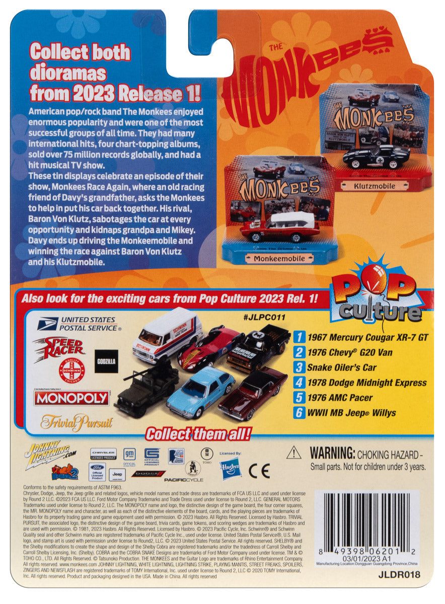 Johnny Lightning The Monkees Shelby Daytona Cobra The Klutzmobile w/Tin display 1:64 Scale Diecast