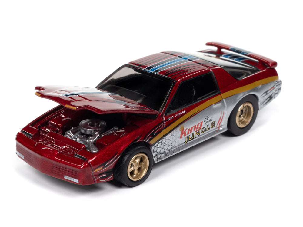 Johnny Lightning Muscle Cars 1987 Pontiac Trans Am King of the Jungle (Metallic Red w/Silver & Gold + King of the Jungle Race Graphics) 1:64 Scale Diecast