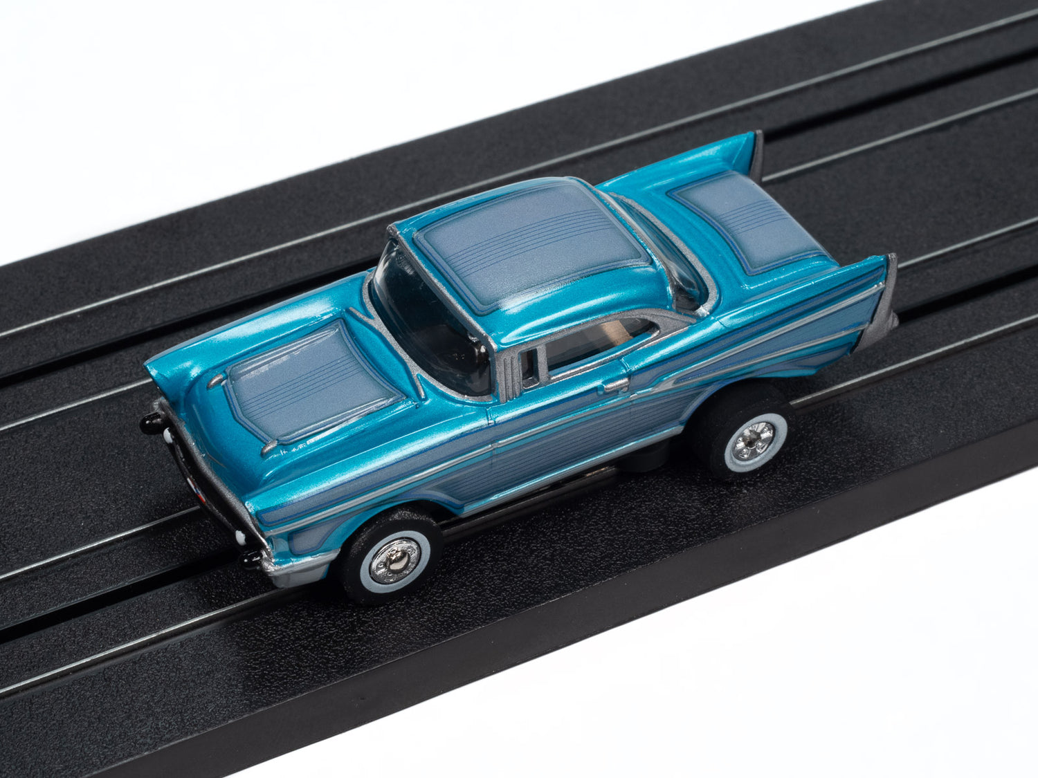 Auto World Thunderjet 1957 Chevrolet Bel Air Lowrider (Aqua) HO Scale Slot Car