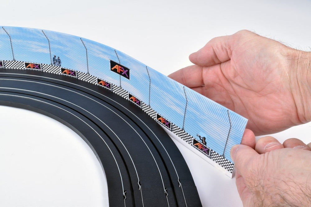 3pc AFX Race Barrier Slot Car Accessory being assembled