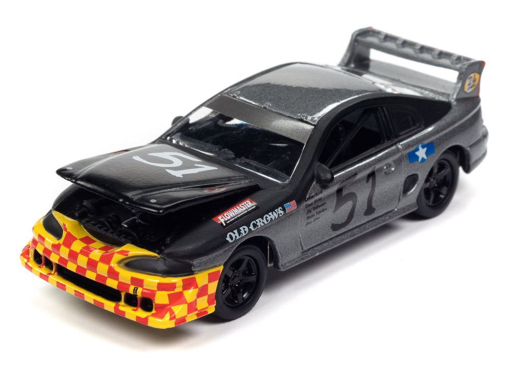 Johnny Lightning Street Freaks 1990s Ford Mustang Race Car (24hrs of LeMons) (Flat Black/Dark Silver, Old Crows Graphics) 1:64 Scale Diecast