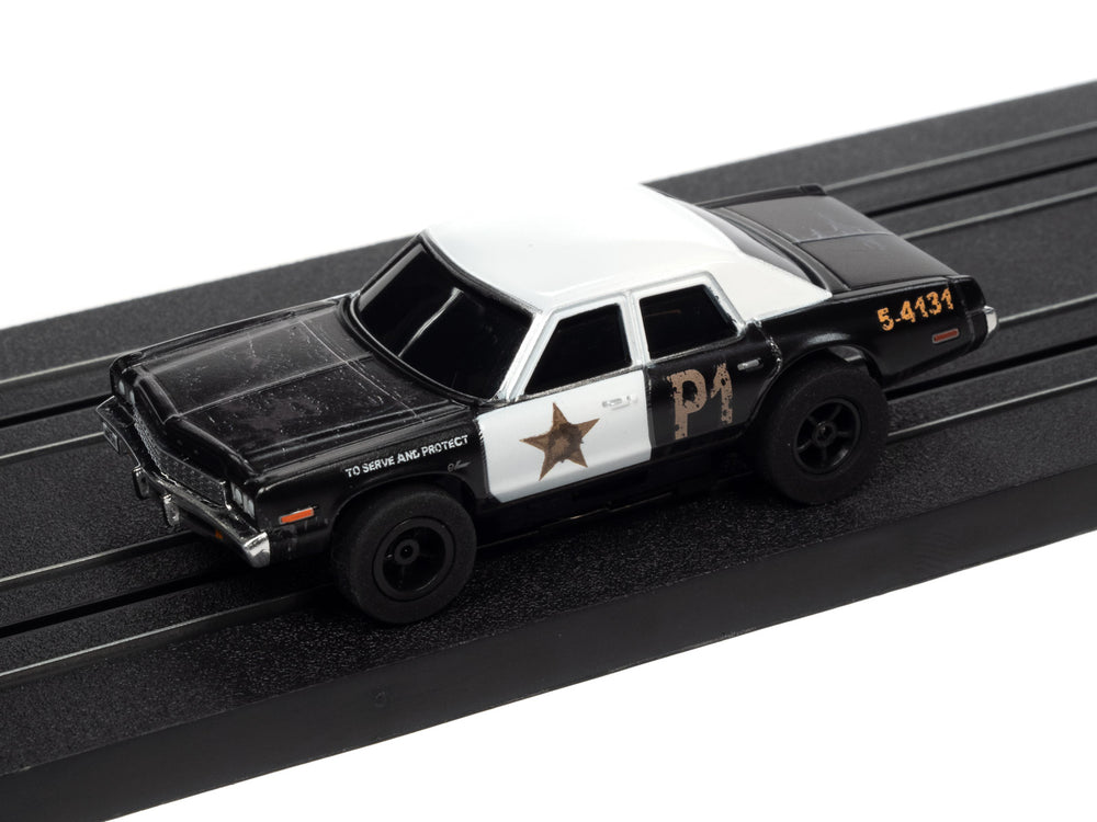 Auto World Xtraction R36 Blues Brothers - Blues Mobile 1974 Dodge Monaco HO Scale Slot Car