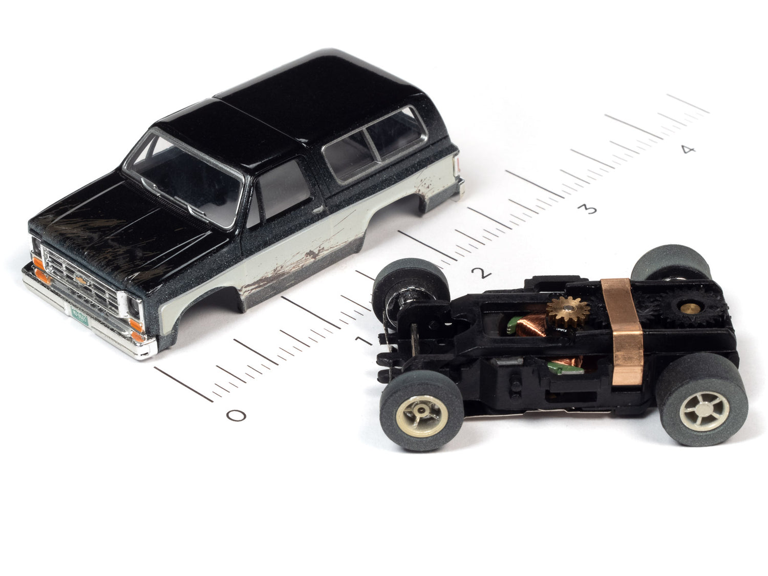 Auto World Xtraction 1977 Chevrolet Blazer (Black/White) HO Scale Slot Car