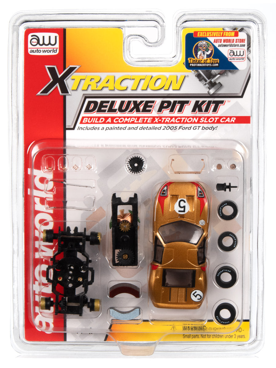 Auto World X-Traction Deluxe Pit Kit w/ 2005 Ford GT Gold Painted Body
