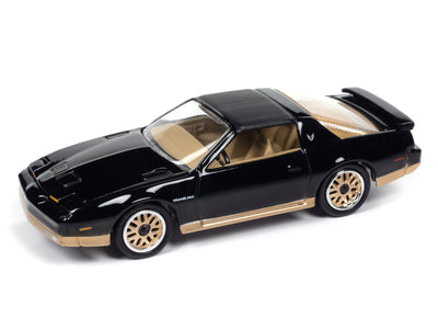 "PRE-ORDER" Johnny Lightning Muscle Cars 1987 Pontiac Trans Am (Gloss Black w/Gold Lower) 1:64 Scale Diecast (DUE NOVEMBER 2025)