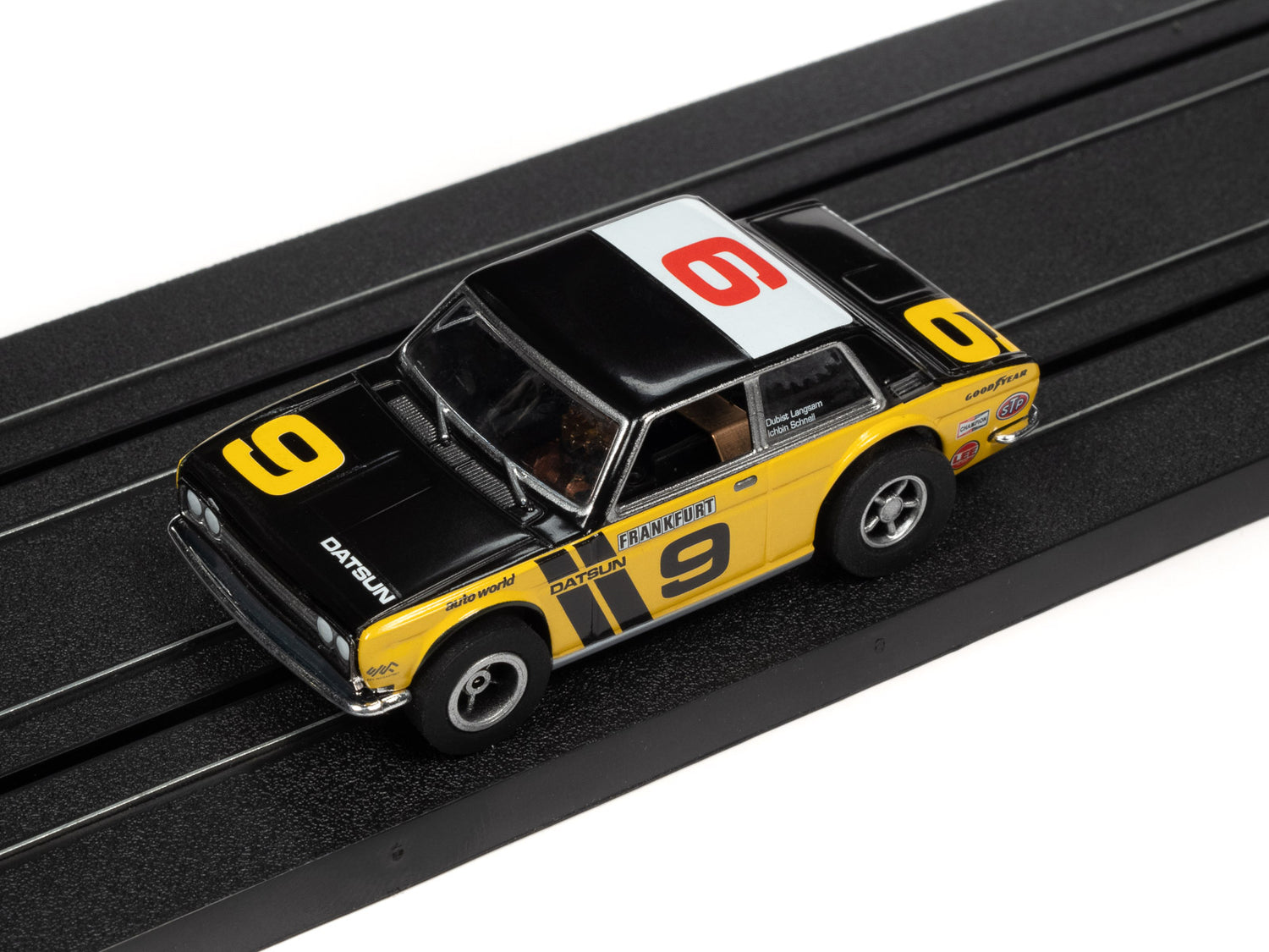 Auto World Xtraction 1970 Datsun 510 (Yellow) HO Slot Car