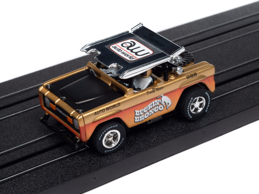 Auto World Xtraction 1972 Ford Baja Bronco - Gold w/ Orange Race Graphics HO Scale Slot Car