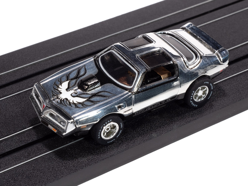 "PRE-ORDER" Auto World Xtraction 1978 Pontiac Firebird T/A (Chrome, Black & White) HO Scale Slot Car (DUE MAY 2025)