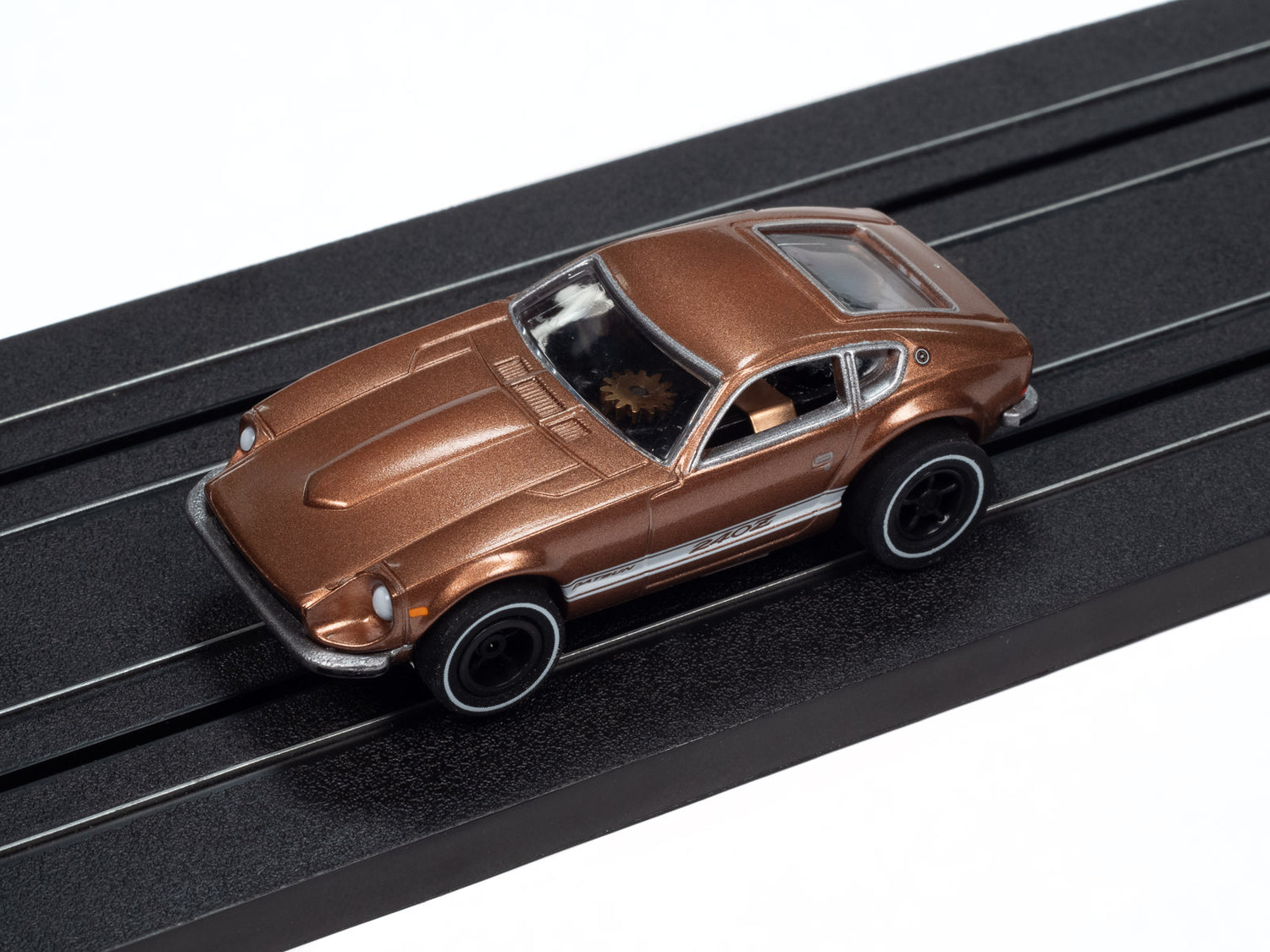 Auto World Xtraction 1973 Datsun 240z (Brown) HO Scale Slot Car