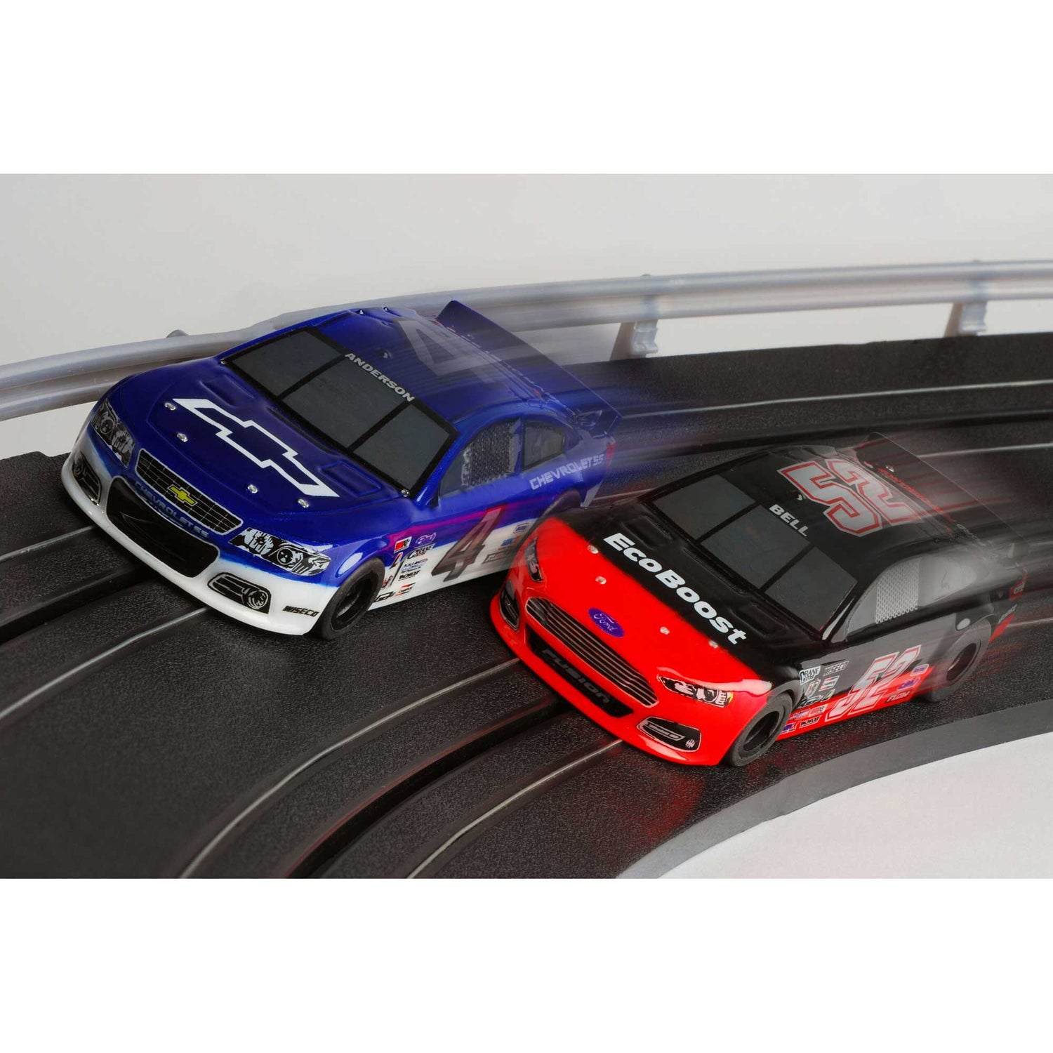 2 AFX Stock Cars HO Scale Slot Cars on the model track