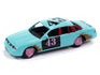 Johnny Lightning Street Freaks 1997 Ford Crown Victoria (Demolition Derby) (Light Teal w/Derby Graphics) 1:64 Scale Diecast