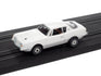 Auto World Thunderjet R34 1963 Studebaker Avanti (White) HO Scale Slot Car