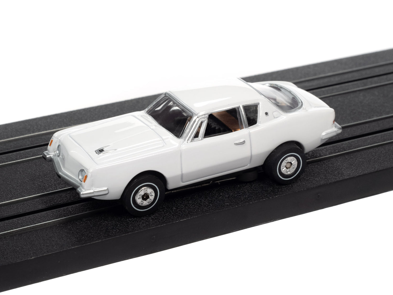 Auto World Thunderjet R34 1963 Studebaker Avanti (White) HO Scale Slot Car