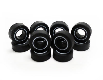 thumbnail image 2 of Auto World Ultra G Chassis Slot Car Tires – 16 Pair (32 Tires) For 1/64 HO Scale, Front & Rear Set (Black Silicone) 2 of 6
